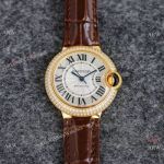 Swiss Copy Cartier Ballon Bleu 33mm NH05 Watch Inlaid with Diamonds Gold Case